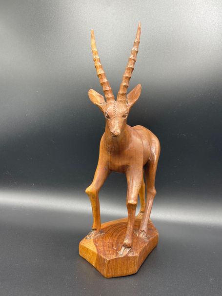Carved teak antelope